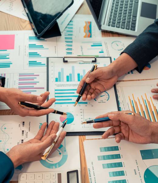 Group of Asian businessmen brainstorming on team cooperation Happy team meeting meeting room, business and financial data graphs vertical close-up image