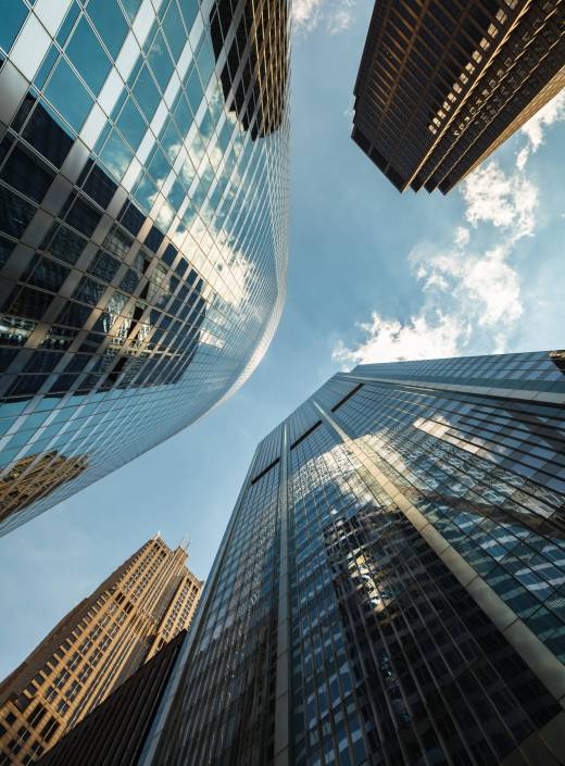 Upward view of modern skyscrapers in downtown Chicago.